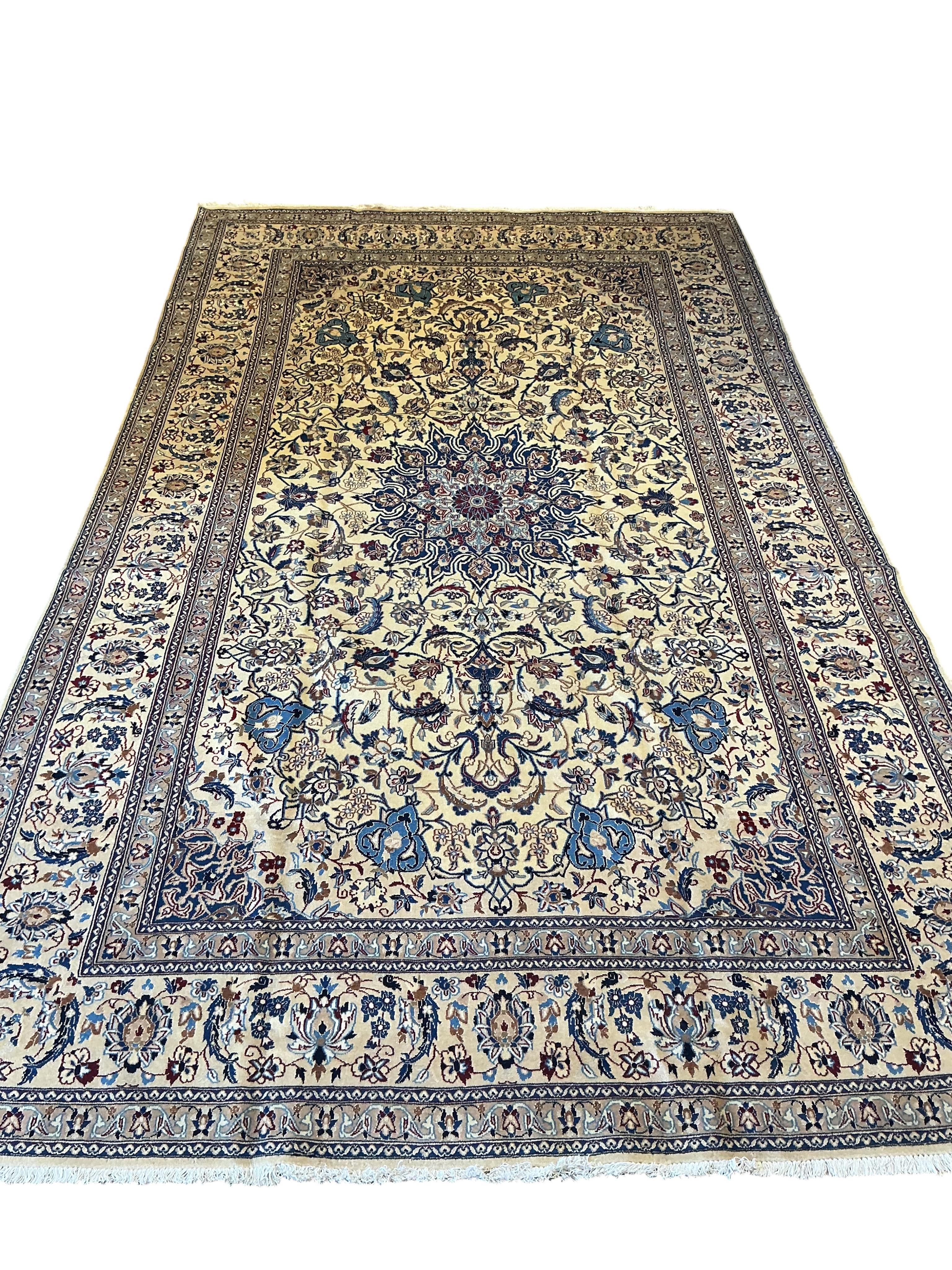 A Nain ivory ground carpet, 341 x 200cm